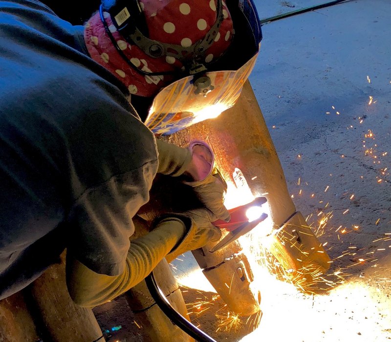 Réparation de godet rétro et de talutage